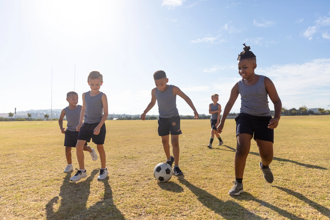 multiracial-elementary-schoolboys-playing-soccer-o-2023-11-27-05-03-02-utc For Schools