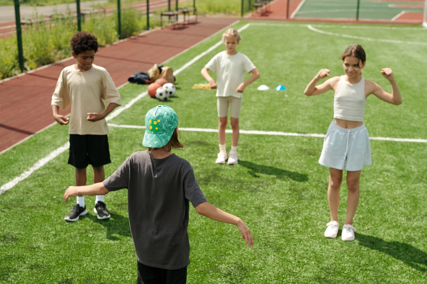 rear-view-of-schoolboy-in-activewear-standing-in-f-2023-11-27-05-35-24-utc For Schools